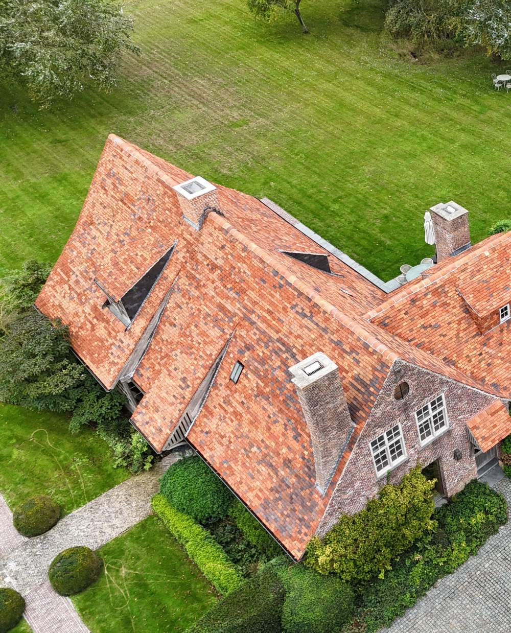 dak ontmossen west vlaanderen